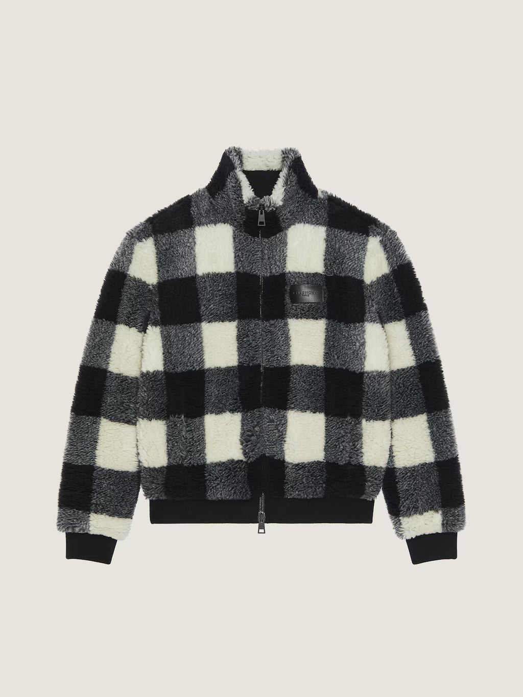 BLOUSON EN POLAIRE À CARREAUX