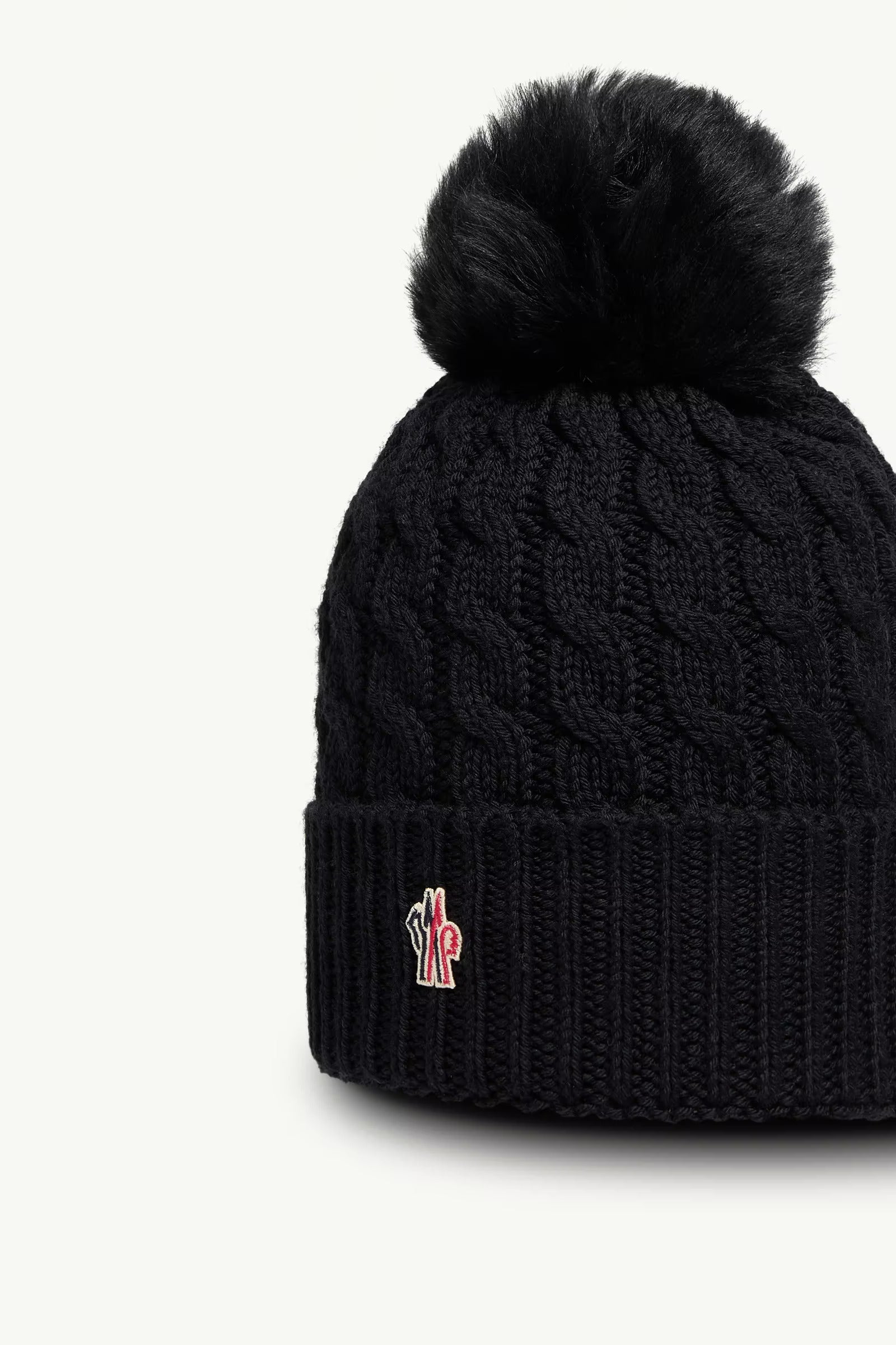 BONNET EN LAINE AVEC POMPON