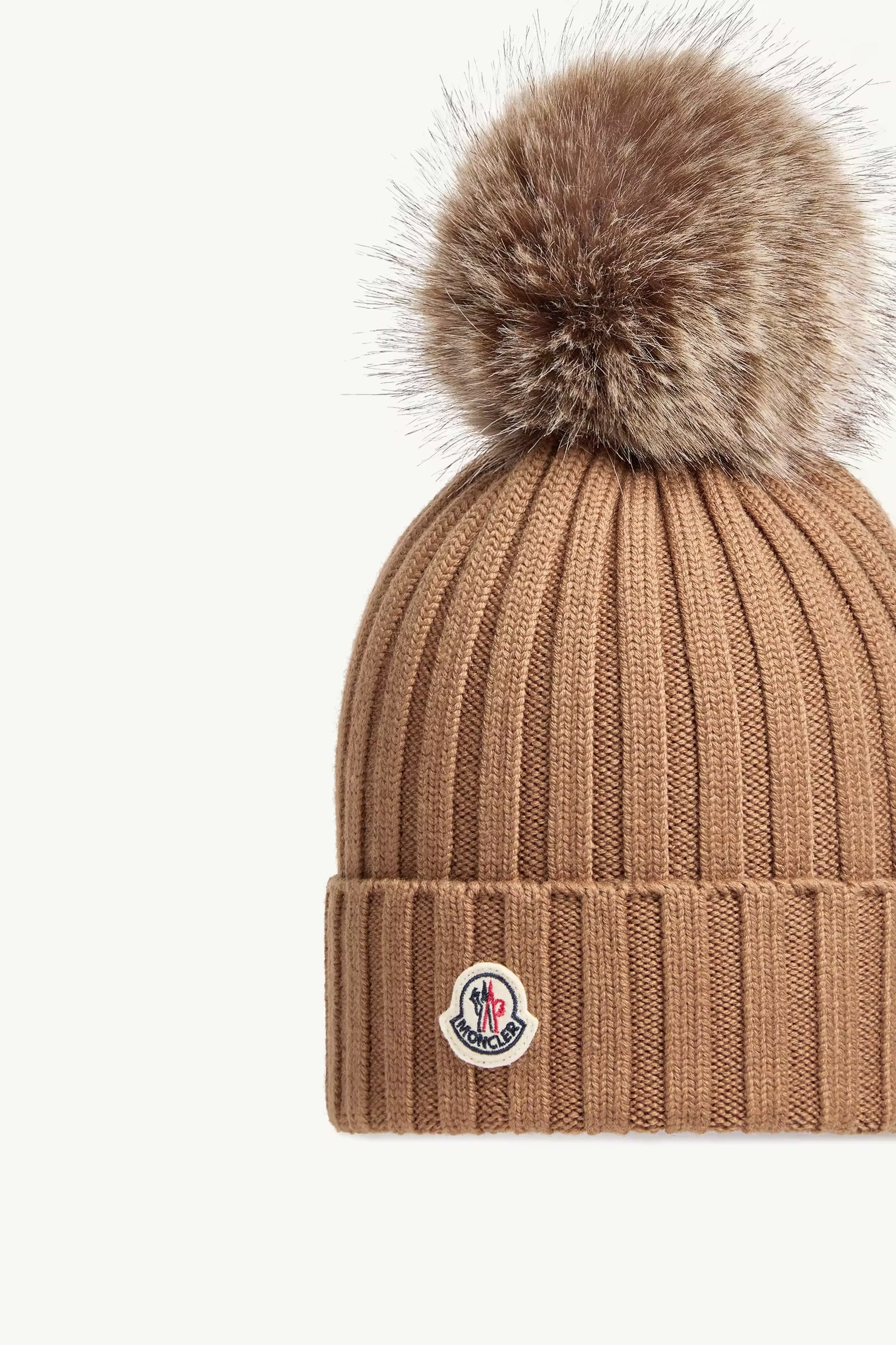 BONNET EN LAINE AVEC POMPON
