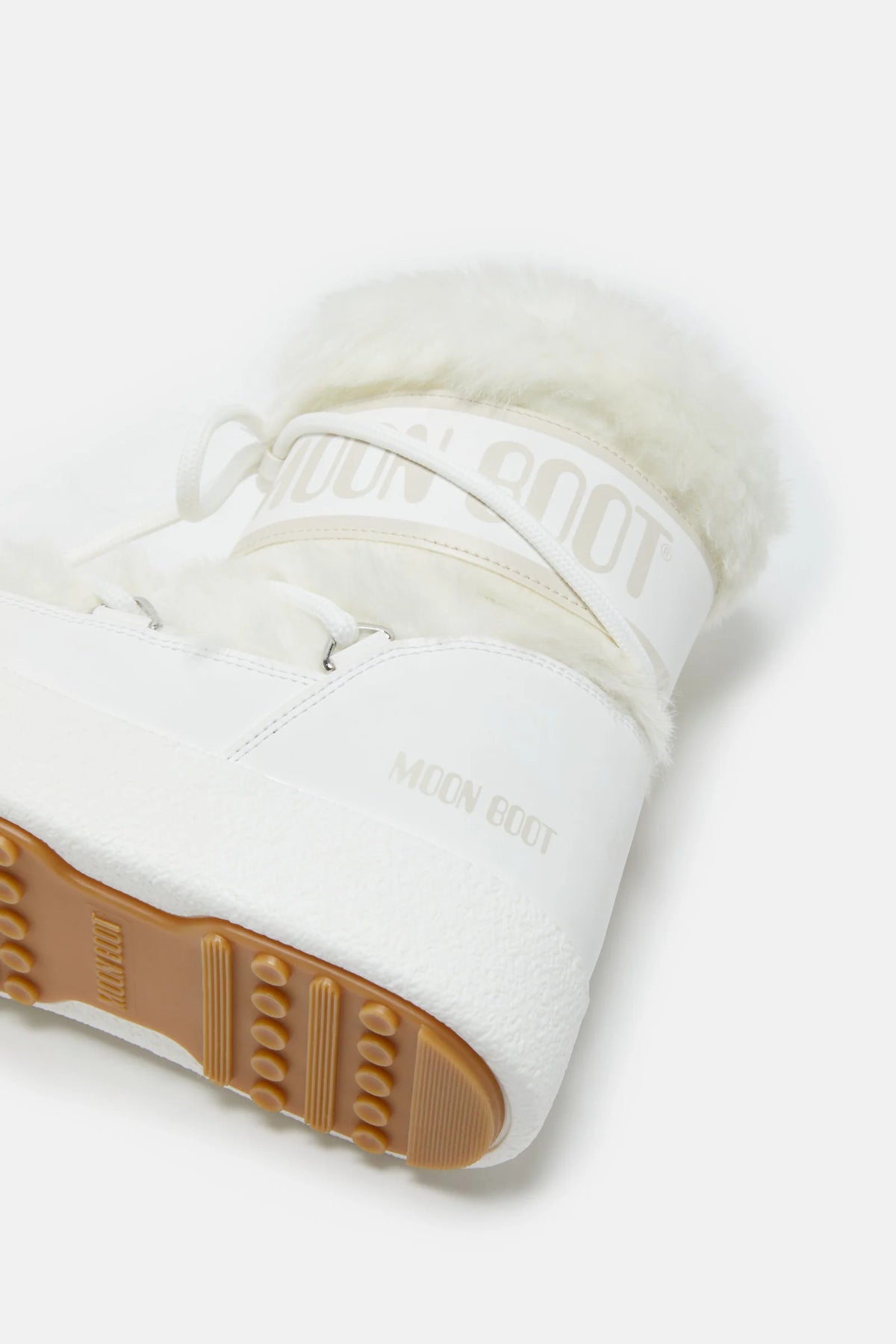 BOTTES LTRACK LOW EN FAUSSE FOURRURE BLANCHE
