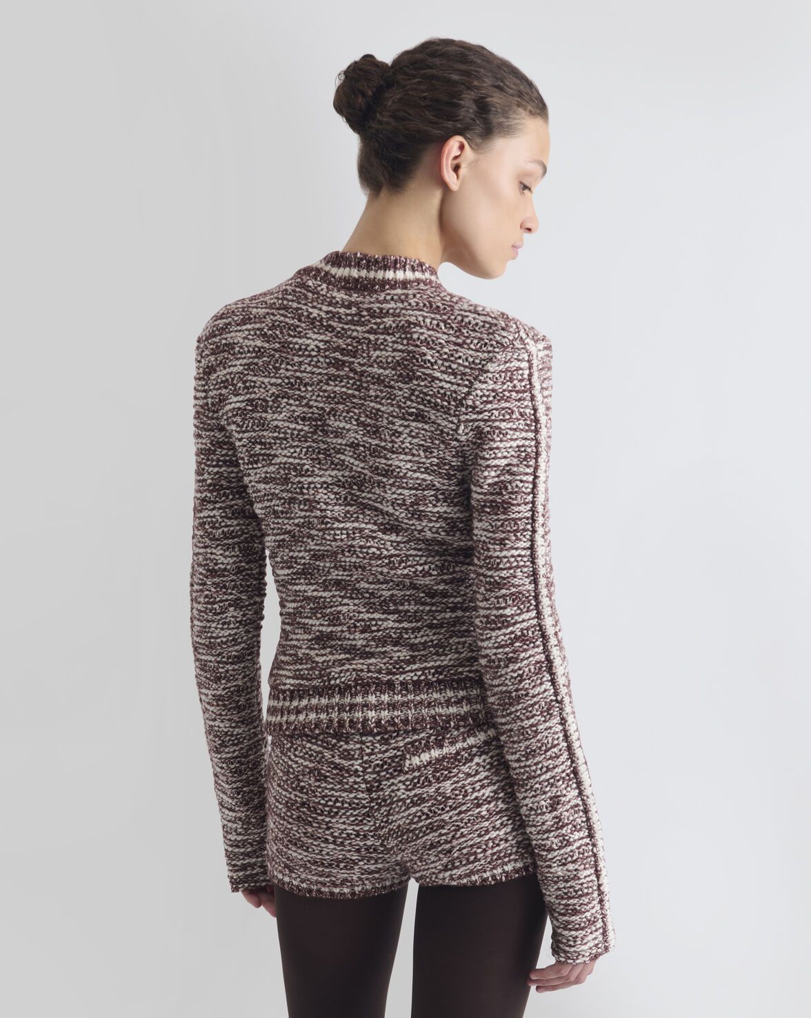 VESTE EN MAILLE AJUSTÉE